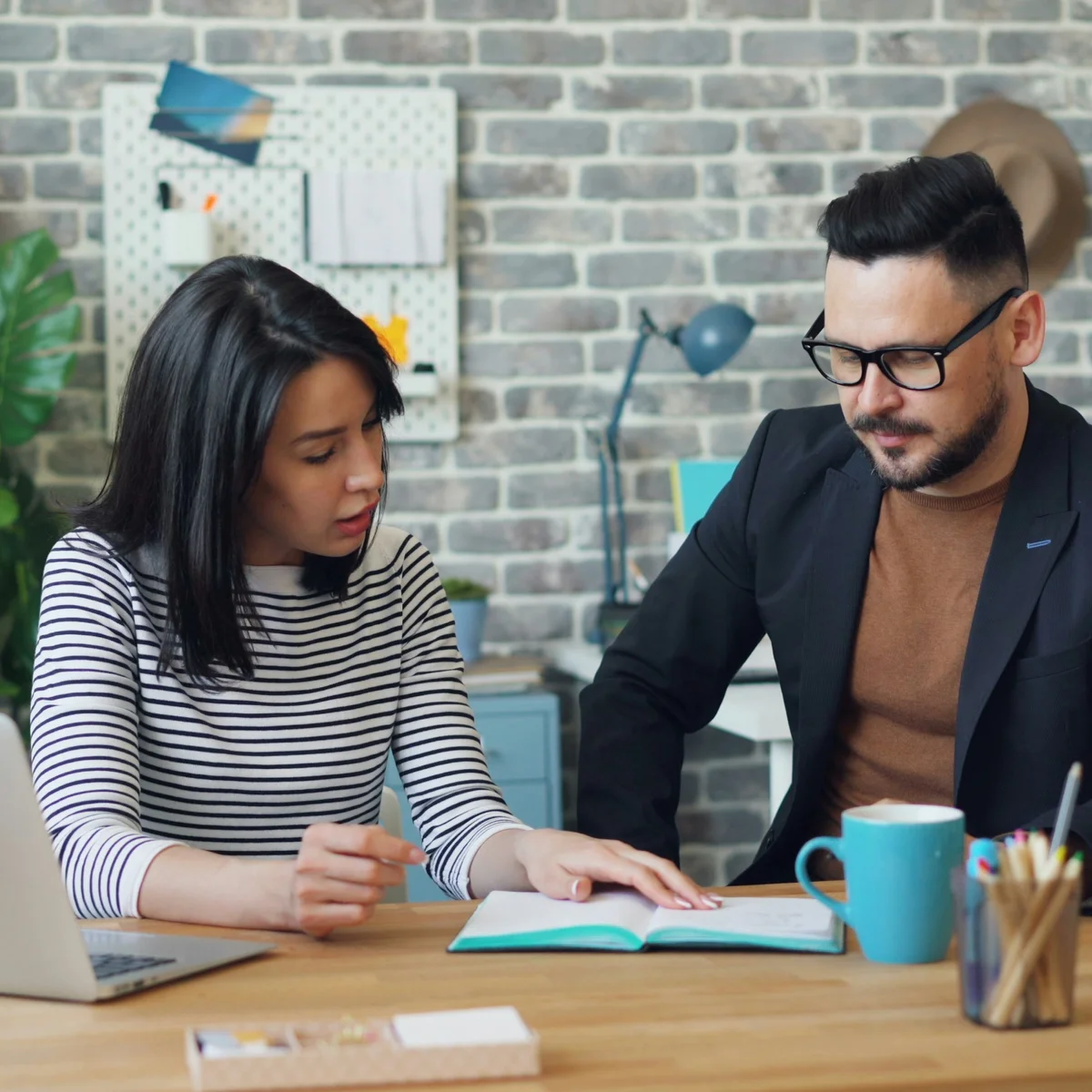 partners talking over coffee