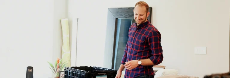 Man sorting and decluttering